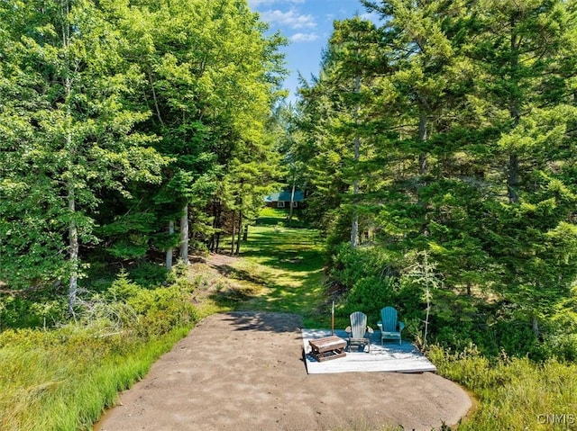 view of property's community featuring a patio area