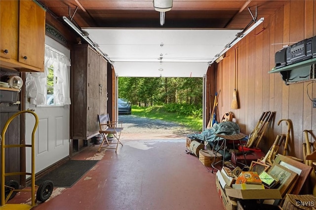 garage with wood walls