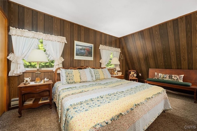 bedroom featuring carpet floors, a baseboard radiator, and wood walls