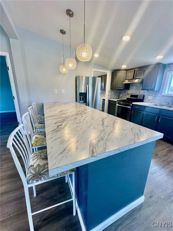 4850 Palmer Rd, Lee, NY 13471 - kitchen featuring dark wood-style flooring, appliances with stainless steel finishes, and tasteful backsplash