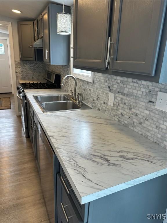 4850 Palmer Rd, Lee, NY 13471 - kitchen featuring a sink, a wealth of natural light, stainless steel appliances, and under cabinet range hood