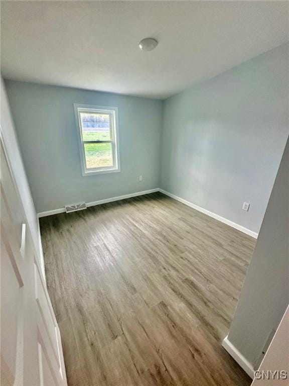 4850 Palmer Rd, Lee, NY 13471 - spare room with baseboards, wood finished floors, and visible vents