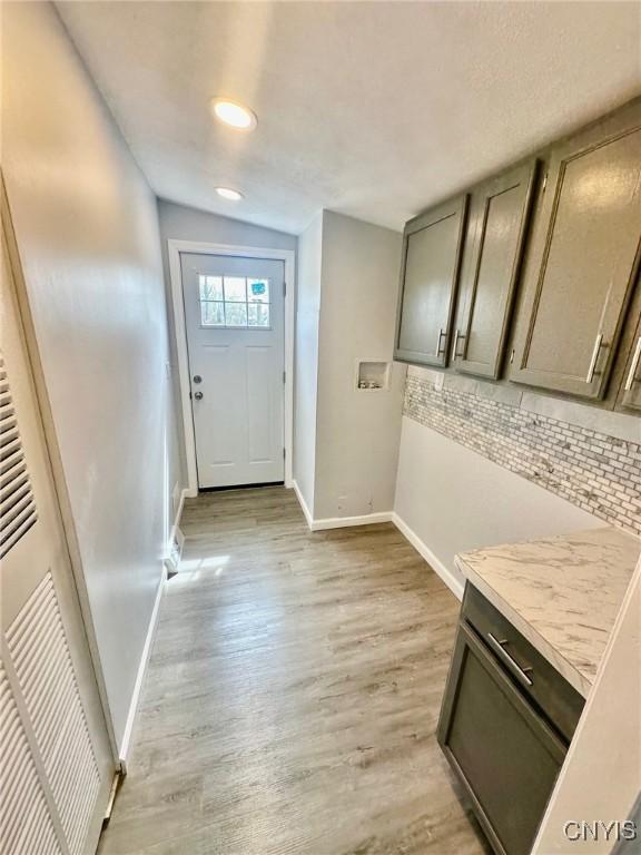 4850 Palmer Rd, Lee, NY 13471 - doorway to outside featuring recessed lighting, baseboards, and light wood-type flooring