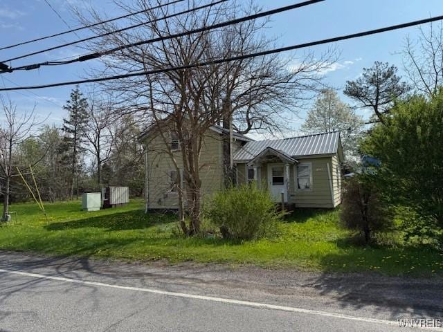 10769 Brant Angola Rd, Brant, NY 14027 - view of side of home with metal roof