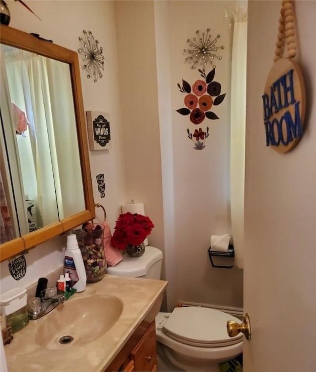 28 Upton Pl, Rochester, NY 14612 - bathroom featuring toilet and vanity