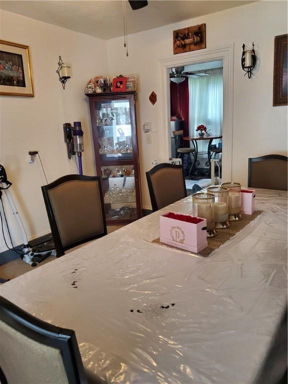 28 Upton Pl, Rochester, NY 14612 - dining space featuring a ceiling fan