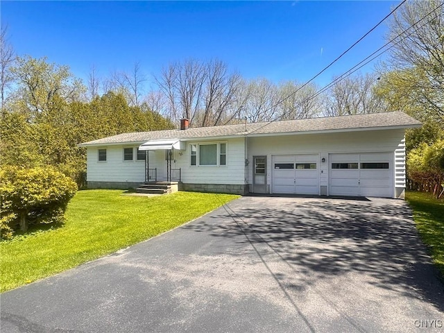 28 Concord Blvd, New Hartford, NY 13413 - ranch-style house with an attached garage, a front lawn, aphalt driveway, and a chimney