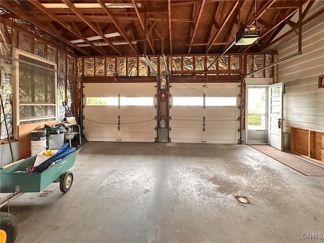 28 Concord Blvd, New Hartford, NY 13413 - garage with a garage door opener