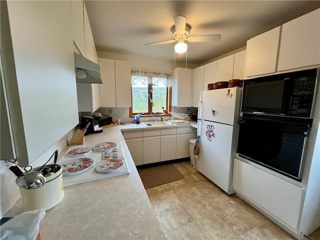 kitchen with ceiling fan, a sink, light countertops, under cabinet range hood, and black appliances