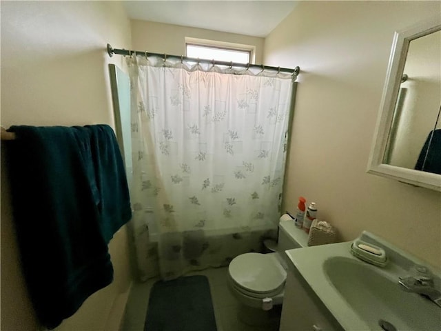 full bath with vanity, toilet, and shower / tub combo
