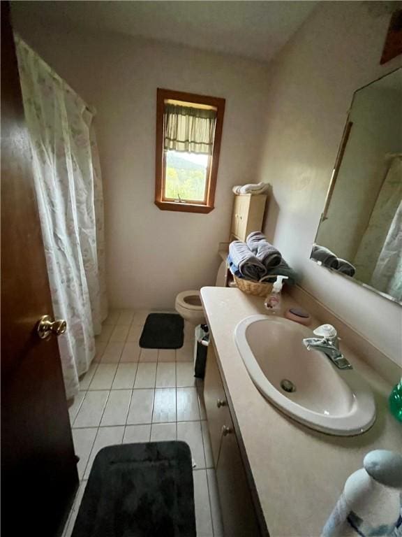full bathroom with toilet, a shower with curtain, tile patterned flooring, and vanity