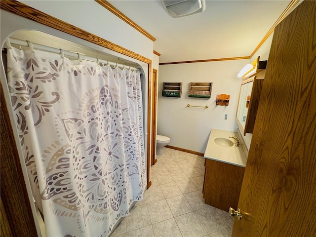 full bath with crown molding, vanity, toilet, baseboards, and tile patterned floors