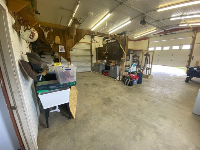 3978 W Waneta Lake Rd, Tyrone, NY 14840 - garage with a garage door opener