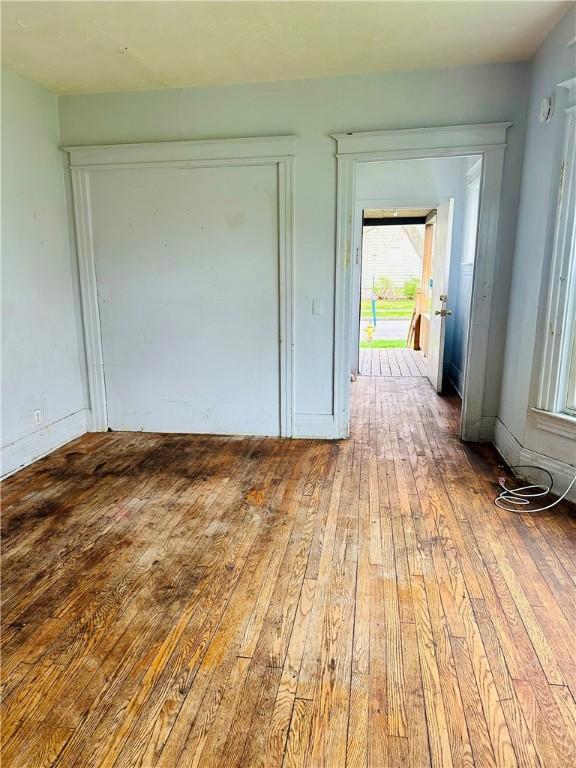 interior space with wood-type flooring and access to outside
