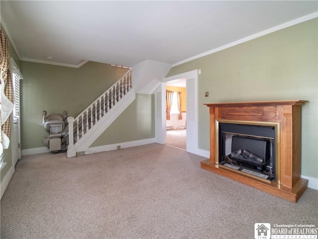 53 W 5th St, Dunkirk-City, NY 14048 - unfurnished living room featuring crown molding, carpet flooring, a fireplace with raised hearth, baseboards, and stairway