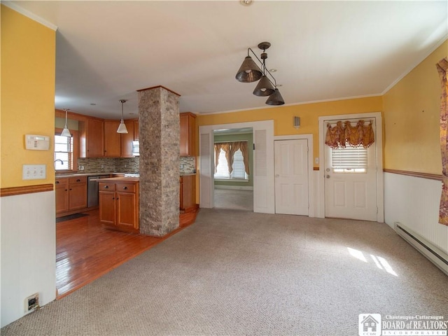 53 W 5th St, Dunkirk-City, NY 14048 - kitchen with tasteful backsplash, baseboard heating, brown cabinets, dishwasher, and carpet floors