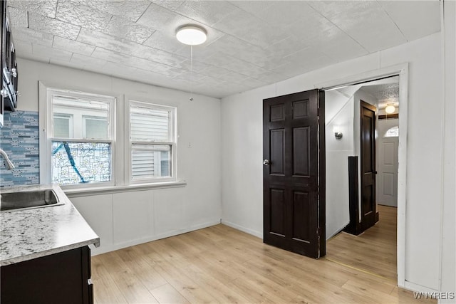 dining area featuring light wood-type flooring
