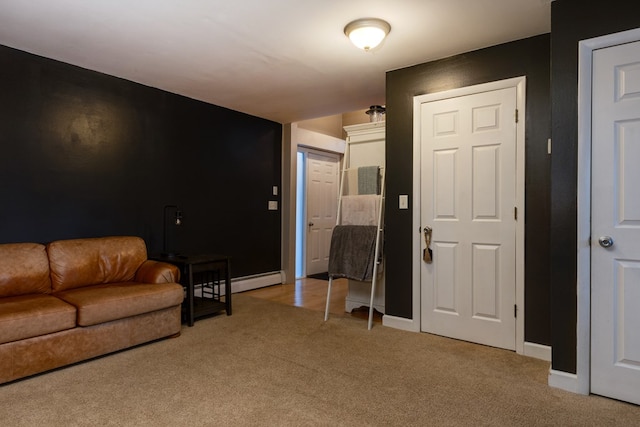 living area with light colored carpet, a baseboard radiator, and baseboards