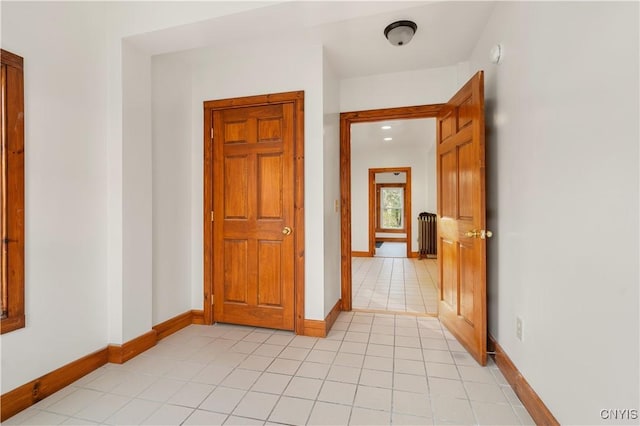 14 Meadow St, Kirkland, NY 13323 - interior space featuring radiator, baseboards, and light tile patterned flooring