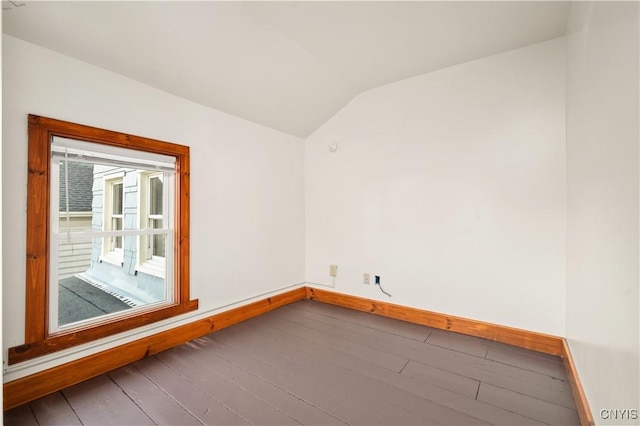 14 Meadow St, Kirkland, NY 13323 - unfurnished room with baseboards, lofted ceiling, and hardwood / wood-style floors