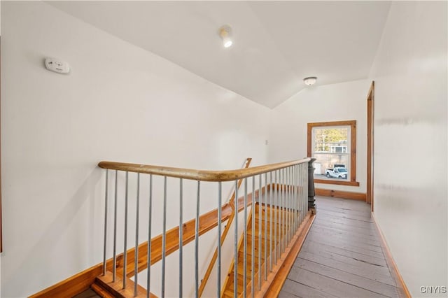 14 Meadow St, Kirkland, NY 13323 - corridor with baseboards, vaulted ceiling, hardwood / wood-style floors, and an upstairs landing