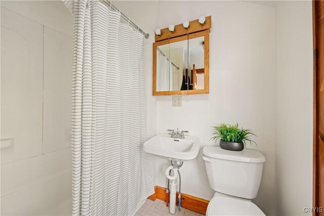 14 Meadow St, Kirkland, NY 13323 - bathroom with a shower with shower curtain and toilet