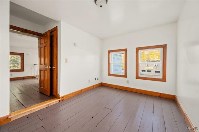 14 Meadow St, Kirkland, NY 13323 - unfurnished room featuring radiator, baseboards, and hardwood / wood-style flooring