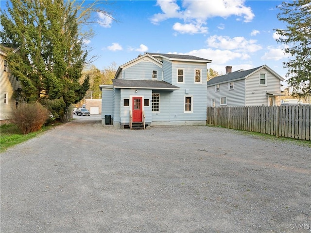 14 Meadow St, Kirkland, NY 13323 - back of house with dirt driveway, fence, and entry steps