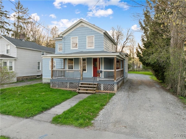 14 Meadow St, Kirkland, NY 13323 - view of front facade featuring a porch, driveway, and a front yard
