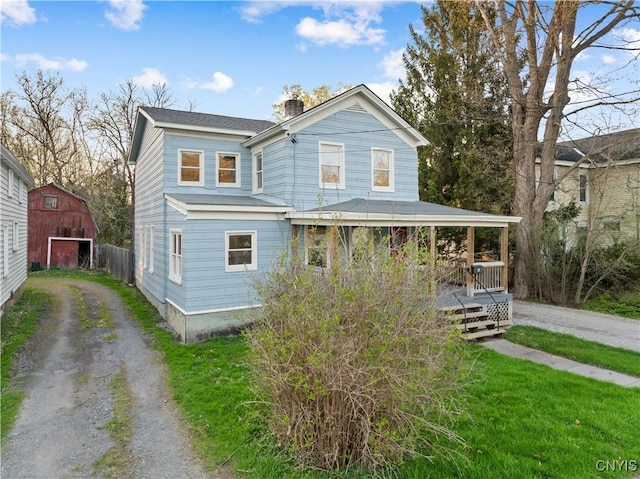 14 Meadow St, Kirkland, NY 13323 - back of property with a barn, an outdoor structure, driveway, and a chimney