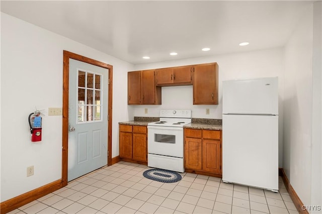 14 Meadow St, Kirkland, NY 13323 - kitchen with white appliances, recessed lighting, and brown cabinetry