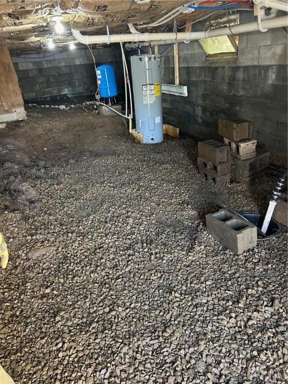 746 Gaffey Rd, Harpersfield, NY 12167 - basement view of electric water heater and a water pressure tank