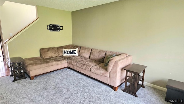 living room with carpet floors and baseboards