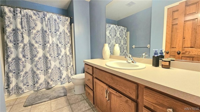 bathroom with visible vents, tile patterned flooring, vanity, toilet, and a shower with shower curtain