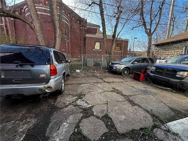 66 W Parade Ave, Buffalo, NY 14208 - view of parking / parking lot with fence