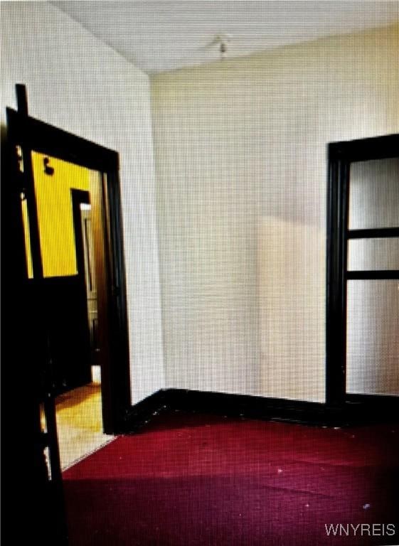 66 W Parade Ave, Buffalo, NY 14208 - carpeted spare room featuring baseboards