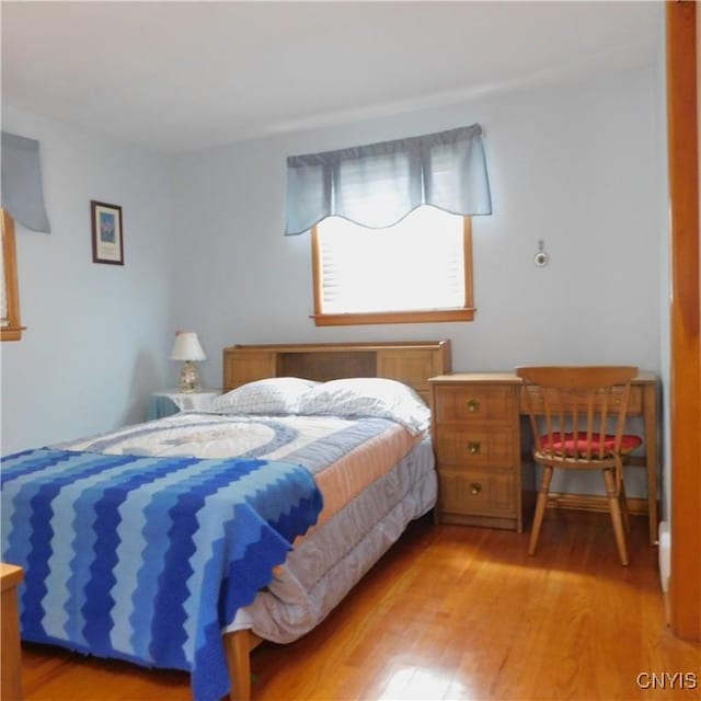 bedroom featuring light wood-type flooring