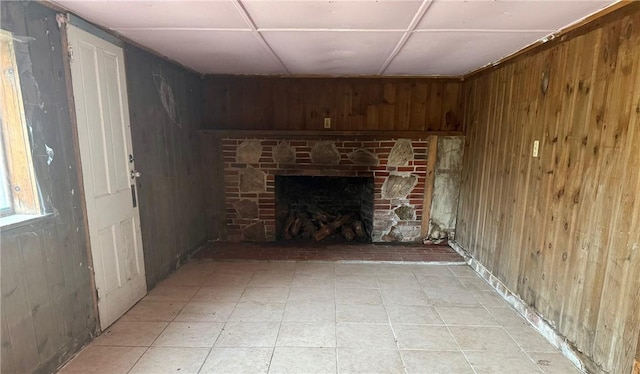 22 W Hazel St, Corning-City, NY 14830 - unfurnished living room with a fireplace and wood walls