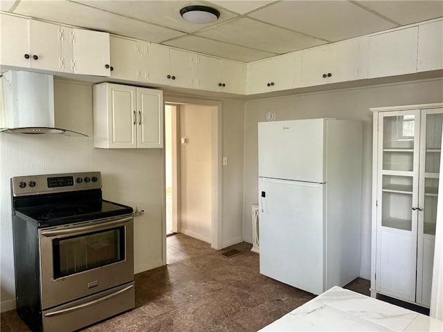 22 W Hazel St, Corning-City, NY 14830 - kitchen with wall chimney range hood, stainless steel electric range oven, baseboards, freestanding refrigerator, and white cabinetry