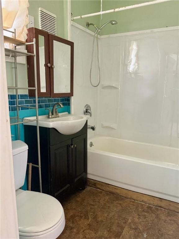 22 W Hazel St, Corning-City, NY 14830 - bathroom featuring toilet,  shower combination, decorative backsplash, and vanity