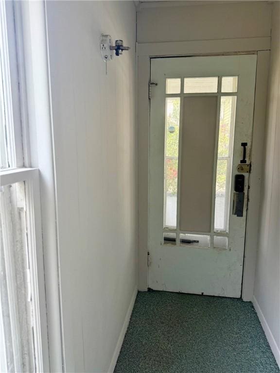 22 W Hazel St, Corning-City, NY 14830 - doorway with baseboards and carpet