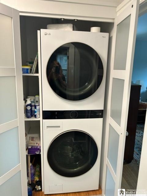 4 Brewer Pl, Westfield, NY 14787 - clothes washing area with laundry area, stacked washer and dryer, and wood finished floors