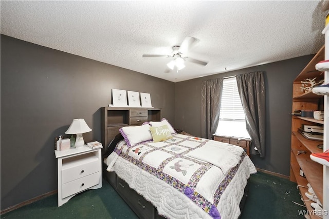 bedroom with baseboards, a textured ceiling, ceiling fan, and dark carpet