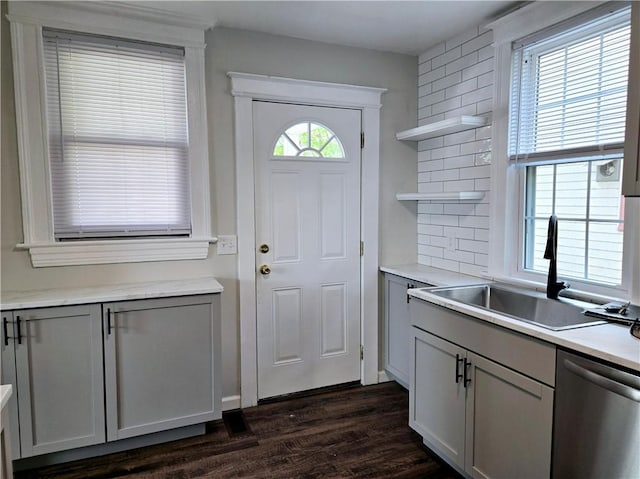 interior space featuring a sink and dark wood-style flooring