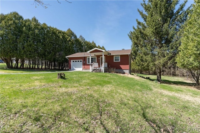 ranch-style house with an attached garage and a front lawn