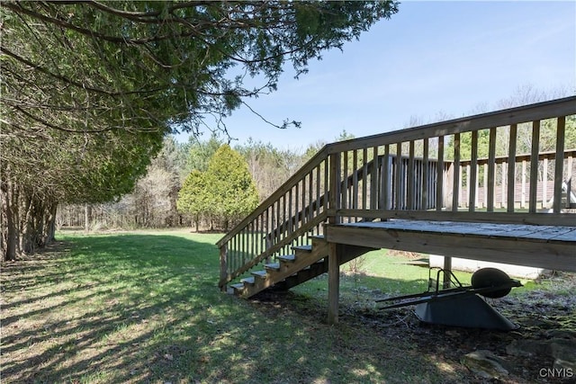view of yard with stairway and a deck