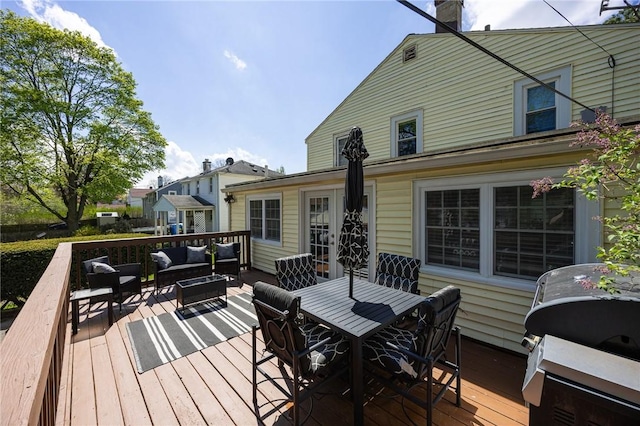 deck with outdoor lounge area