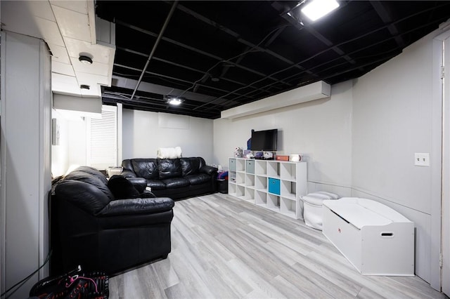 living area with wood finished floors