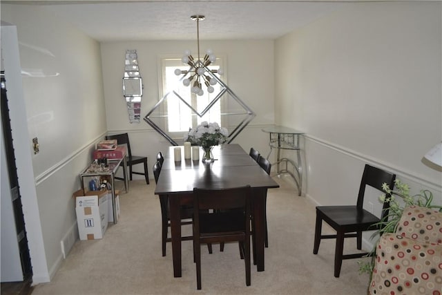 86 Everwild Ln, Greece, NY 14616 - dining space featuring light colored carpet and a chandelier