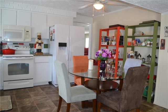 86 Everwild Ln, Greece, NY 14616 - dining space featuring stone finish floor, ceiling fan, and ornamental molding